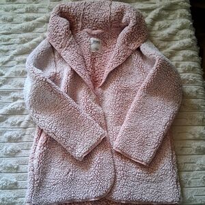 Very soft and cozy Sherpa sweatshirt/jacket. Color is light pink